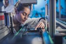 Female engineer working in a lab